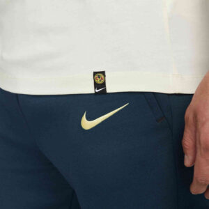Nike club cuffed hot sale sweatpants in pale blue